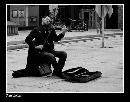He is a not so typical street performer. He was REALLY into himself playing. So much so that it made me take this picture. He is a not so typical street performer. He was REALLY into himself playing. So much so that it made me take this picture.